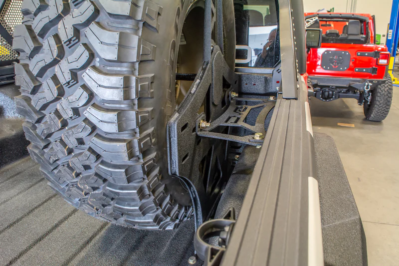 DV8 Offroad 2019+ Jeep Gladiator Universal Stand Up In-Bed Tire Carrier - Image 9
